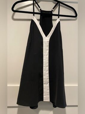 Black and white tank top with adjustable straps size medium